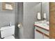 Small powder room with toilet and sink at 3720 Willow Ave, Deland, FL 32720