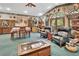Large dining area with eclectic decor, including hunting trophies and casual seating at 3720 Willow Ave, Deland, FL 32720