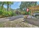 Charming brick home with well-maintained landscaping and a convenient carport, blending style and functionality at 3720 Willow Ave, Deland, FL 32720