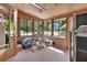 Bright sun room with skylight, brick floor, and fitness equipment at 3720 Willow Ave, Deland, FL 32720