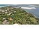 Gorgeous aerial view showcasing the home's proximity to the ocean and natural surroundings at 4901 Sailfish Dr, Ponce Inlet, FL 32127