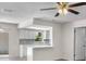 Bright, open-concept kitchen featuring sleek countertops and stainless steel appliances at 4901 Sailfish Dr, Ponce Inlet, FL 32127