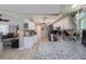 Bright kitchen with white cabinets, granite countertops, and stainless steel appliances at 516 Spotted Sandpiper Dr, Daytona Beach, FL 32119