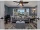 Cozy sitting room with bay window, comfortable seating, and stylish decor at 516 Spotted Sandpiper Dr, Daytona Beach, FL 32119