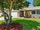 A well manicured lawn highlights this lovely home at 934 Tall Pine Dr, Port Orange, FL 32127