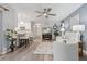 Inviting living room featuring modern finishes, stylish furnishings, and a seamless flow to the kitchen at 934 Tall Pine Dr, Port Orange, FL 32127