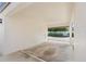 Attached carport with ample space and exterior storage options at 1 Tomoka Oaks Blvd # 135, Ormond Beach, FL 32174