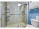 Modern shower with glass enclosure, neutral tile, and updated fixtures at 1 Tomoka Oaks Blvd # 135, Ormond Beach, FL 32174