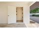 Conveniently located outdoor storage unit with shelves in the carport area at 1 Tomoka Oaks Blvd # 135, Ormond Beach, FL 32174