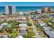 Aerial view showing the home's proximity to the beach and hotels, highlighting its convenient location and coastal access at 129 Dundee Rd, Daytona Beach, FL 32118