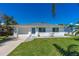 Charming single-story home with a well-maintained lawn and a freshly painted exterior at 129 Dundee Rd, Daytona Beach, FL 32118