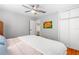 Spacious main bedroom featuring hardwood floors, light gray walls and closet space at 129 Dundee Rd, Daytona Beach, FL 32118