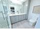 Chic bathroom with modern fixtures, glass-enclosed shower, and a stylish vanity area at 13 Sunrise Ave, Ormond Beach, FL 32176