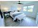 Calm bedroom design with a plush bed, soft lighting, and serene decor for ultimate relaxation at 13 Sunrise Ave, Ormond Beach, FL 32176