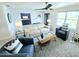 Cozy living room with comfortable seating, decorative rug, and a serene atmosphere at 13 Sunrise Ave, Ormond Beach, FL 32176