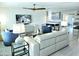 Spacious living area with an open floor plan, modern decor, and seamless flow to the kitchen at 13 Sunrise Ave, Ormond Beach, FL 32176