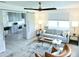 Open-concept living room with a modern kitchen view, creating a seamless living space at 13 Sunrise Ave, Ormond Beach, FL 32176