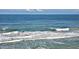 Expansive ocean view with gentle waves under a clear sky at 13 Sunrise Ave, Ormond Beach, FL 32176