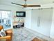 Bright office space with a desk, sliding barn door, and comfortable seating at 13 Sunrise Ave, Ormond Beach, FL 32176