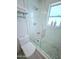 Stylish shower featuring contemporary fixtures and mosaic tile flooring for an elegant touch at 13 Sunrise Ave, Ormond Beach, FL 32176