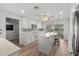 Well-equipped kitchen with stainless appliances, ample counter space, an island, and seamless access to outdoor entertaining at 136 Reef Rd, South Daytona, FL 32119