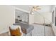 Well-lit home office with a stylish desk, comfortable chair, and seamless flow into adjacent living spaces at 136 Reef Rd, South Daytona, FL 32119