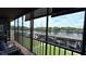 Enjoy the view from this screened balcony overlooking the waterway at 1640 Juno Trl # 202E, Astor, FL 32102