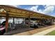 Covered community boat dock with multiple slips for boats and jet skis at 1640 Juno Trl # 202E, Astor, FL 32102