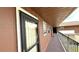 Exterior hallway and walkways to the units, creating a welcoming, private entrance at 1640 Juno Trl # 202E, Astor, FL 32102
