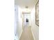 Hallway with laundry and access to other rooms at 1640 Juno Trl # 202E, Astor, FL 32102