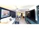 Inviting living room with stylish decor and lots of natural light at 1640 Juno Trl # 202E, Astor, FL 32102