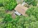 Birds-eye view of this wooded home, featuring a back porch and nice sized lot at 2101 Almond St, Orange City, FL 32763