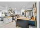 Bright, modern kitchen features white cabinets, butcher block countertops, and stainless steel appliances at 2101 Almond St, Orange City, FL 32763