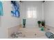Beautiful bathroom includes a garden tub with neutral tile and a garden view at 2934 Oceans Trce, Daytona Beach Shores, FL 32118