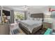 Bright bedroom with modern furniture, neutral colors, and lots of natural light at 2934 Oceans Trce, Daytona Beach Shores, FL 32118