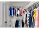 A reach-in closet with a shelf and hanger bar is perfect for keeping clothing organized at 2934 Oceans Trce, Daytona Beach Shores, FL 32118