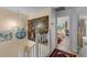 Hallway with chandelier and painting on the wall at 2934 Oceans Trce, Daytona Beach Shores, FL 32118