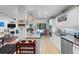 Modern kitchen with stainless steel appliances, granite counters, and seamless connection to living area at 2934 Oceans Trce, Daytona Beach Shores, FL 32118