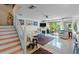 Inviting living room with bright decor, a fireplace and a sliding glass door to outside at 2934 Oceans Trce, Daytona Beach Shores, FL 32118