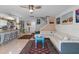 Spacious living room showcases modern decor, comfortable seating, and stairs to the second level at 2934 Oceans Trce, Daytona Beach Shores, FL 32118