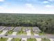 Aerial view of homes next to a nature preserve, showcasing the neighborhood's setting at 3029 Adrian Dr, Ormond Beach, FL 32174