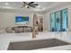 Modern kitchen featuring an island with a sink, and a view into the living space at 3029 Adrian Dr, Ormond Beach, FL 32174