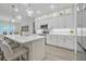 Modern kitchen with white cabinets, quartz countertops, and stainless steel appliances at 3029 Adrian Dr, Ormond Beach, FL 32174