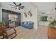 Cozy living room with hardwood floors, custom bar, and comfortable seating at 3029 Adrian Dr, Ormond Beach, FL 32174