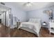 Cozy bedroom with soft lighting, featuring stylish decor and a comfortable bed at 640 N Nova Rd # 117, Ormond Beach, FL 32174
