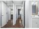 Hallway with mirrored closet, connecting various rooms, showing the floor plan at 640 N Nova Rd # 117, Ormond Beach, FL 32174