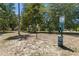 Outdoor community area includes a pet waste station and walking trails at 640 N Nova Rd # 117, Ormond Beach, FL 32174