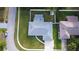 Aerial shot of the house showing the roof and the surrounding landscaped lawn at 807 Scrub Oak St, South Daytona, FL 32119