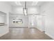 Bright living room with view of entry door and window to backyard at 807 Scrub Oak St, South Daytona, FL 32119