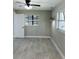 Bedroom features modern fixtures, natural light, and tile floors at 992 Shockney Dr, Ormond Beach, FL 32174